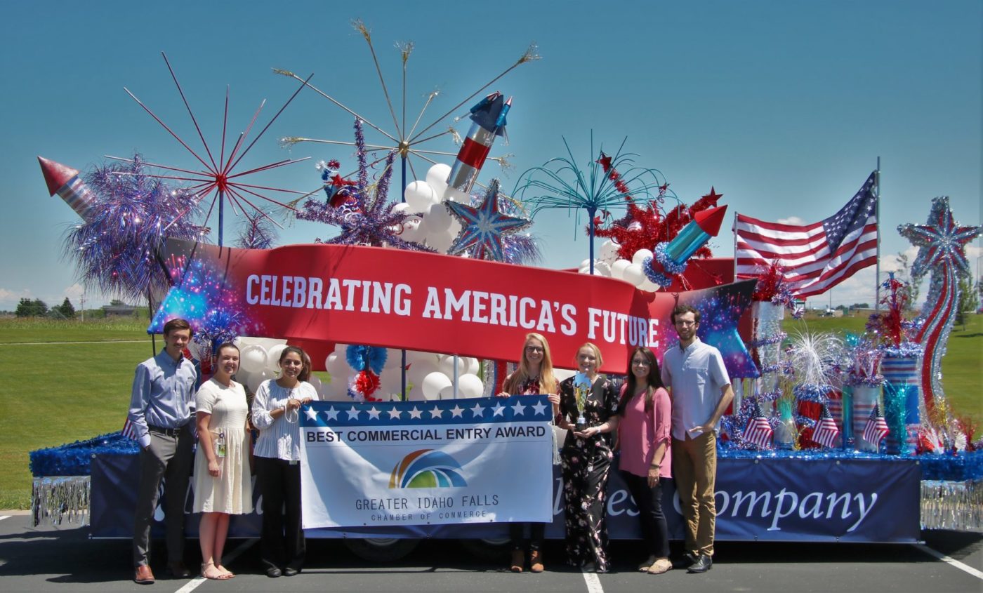 Melaleuca Independence Day Parade Float with several interns who helped to build it