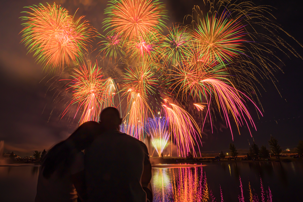 Couple watching Melaleuca Freedom Celebration 2022 Fireworks