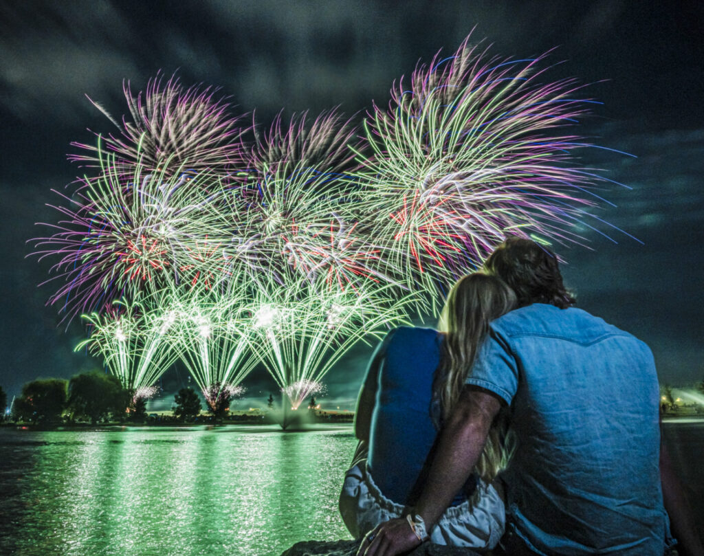 couple at Melaleuca Freedom Celebration firework show